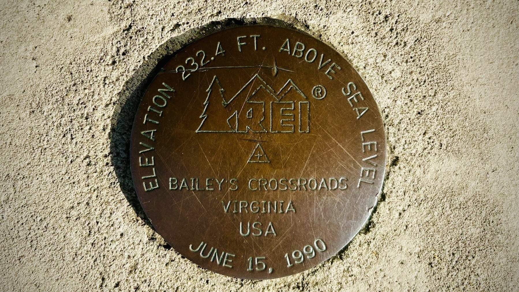 A survey marker for the Bailey’s Crossroads REI